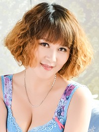 Asian woman Xu (Abby) from Tieling, China